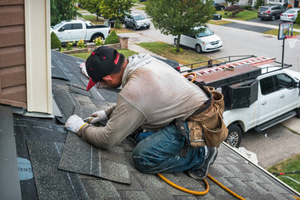 Professional Flat Roof Repair technician working in Stringtown, OK